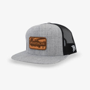 black and brown trucker hat